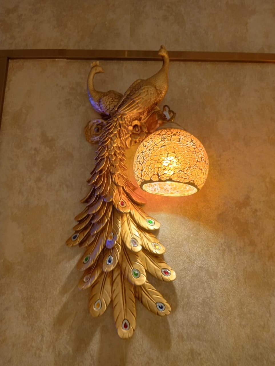 DECORATIVE PEACOCK WALL LIGHT